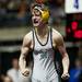 A MHSAA Wrestling Championship competitor celebrates after winning a division four match on Saturday, March 2. Daniel Brenner I AnnArbor.com